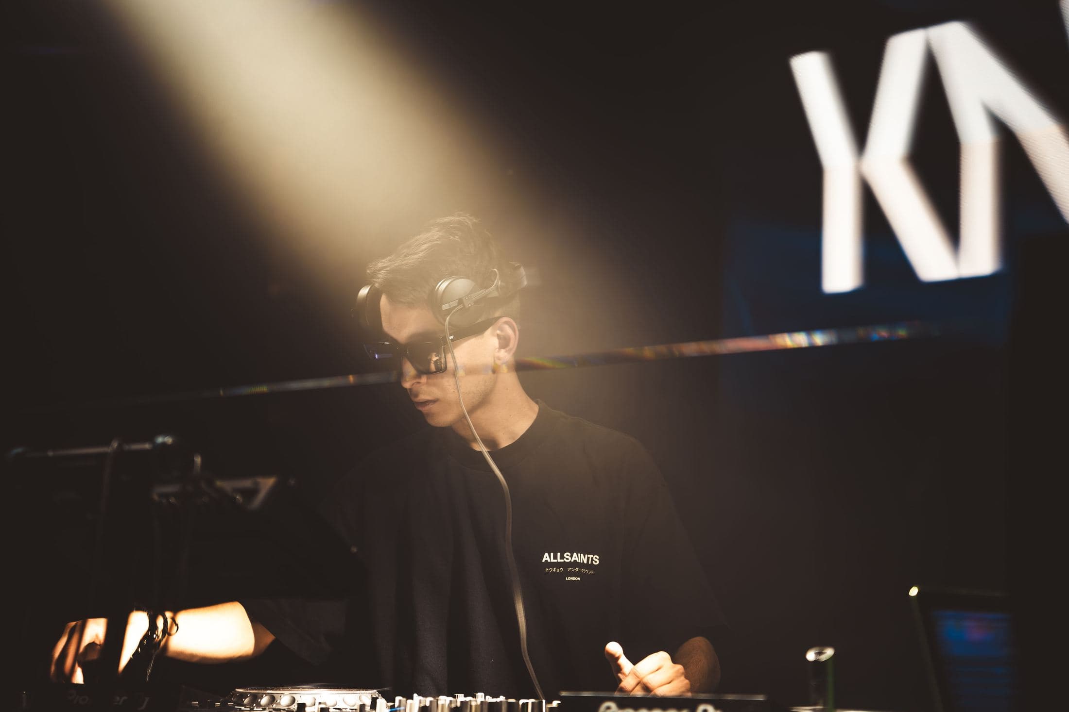 Kike Moreno playing with the KM screen lit behind him